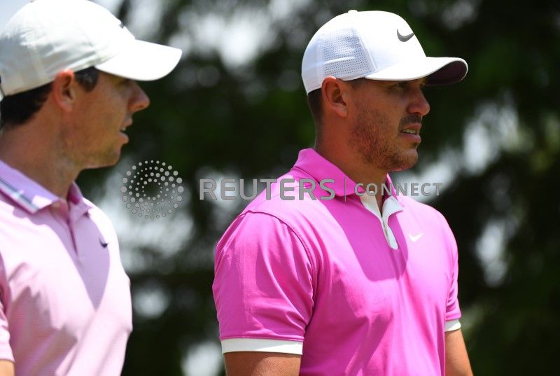 McIlroy shoots 62 to lead Koepka by one 