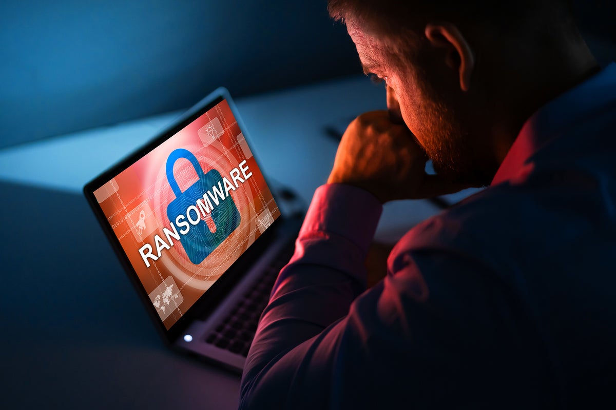 ransomware_attack_worried_businessman_by