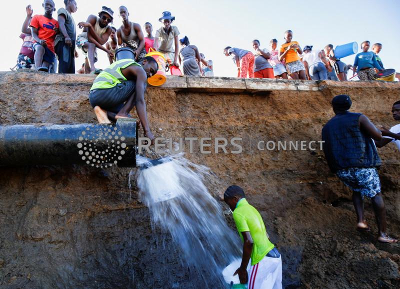 The Fiji Times » S.Africans search for survivors in ruins of floods